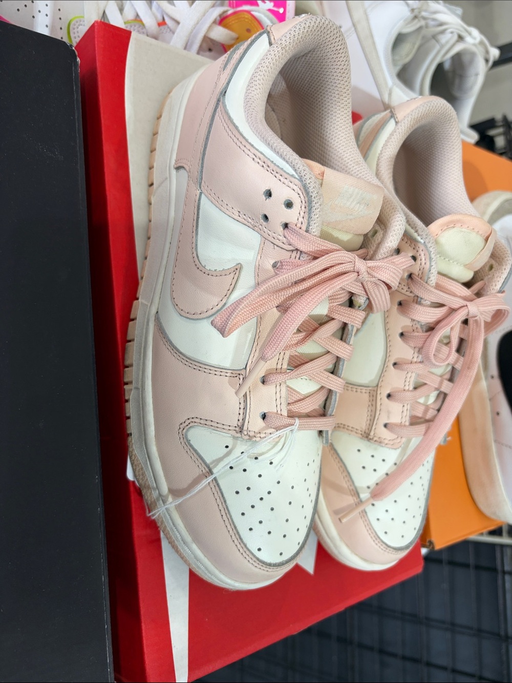 Nike Women's Low-Top Sneakers in Pale Pink and White